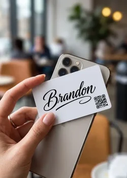 Hand_tapping_card_on_smartphone_202608230250